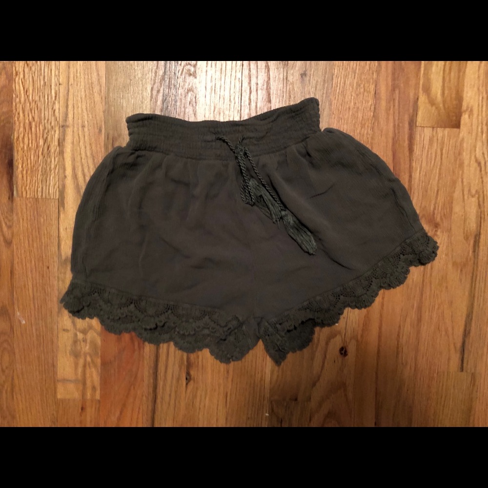 thin green shorts